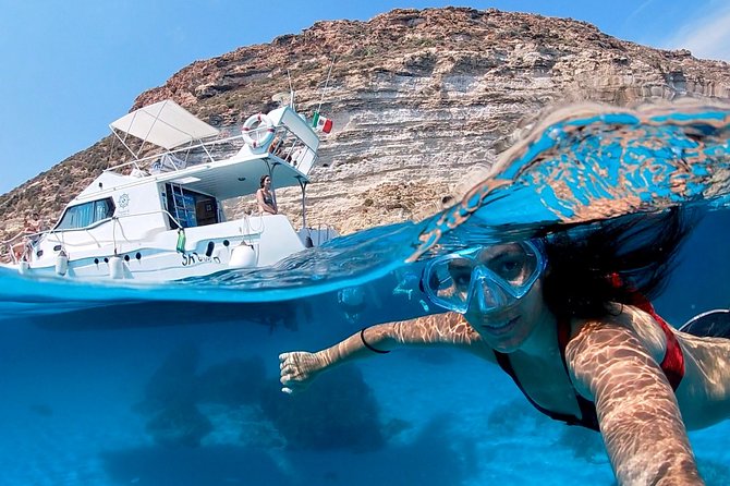 7 hours Boat trip to Lampedusa lunch, SUP and Snorkeling - Key points before you book