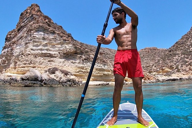 7 hours Boat trip to Lampedusa lunch, SUP and Snorkeling - Swimming, snorkeling, and SUP between stops