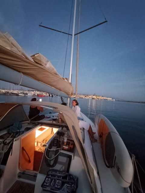 Alghero: Sunset Sailing Aperitif Experience - Sailing out from Alghero Port