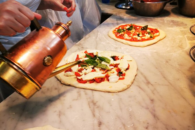 Authentic Pizza Making Class in Naples with Appetizers and Drink - Tasting fior di latte, bread, and Vesuvius tomatoes