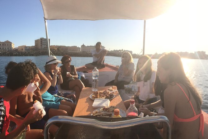 Boat tour of Ortigia Island and sea caves - The optional swim stop