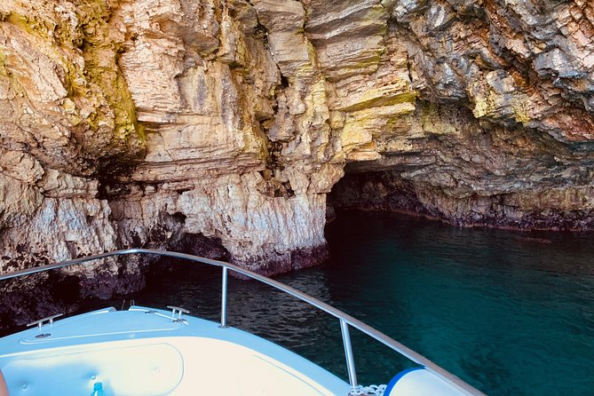Boat tour of the Polignano a Mare caves with aperitif - Grotta Palazzese is the visual highlight