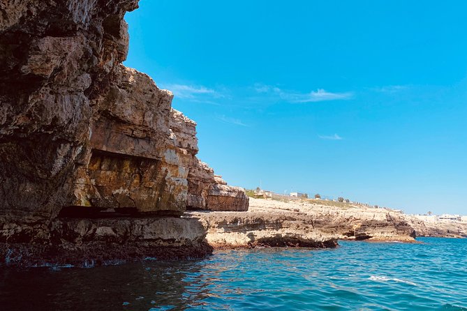 Boat tour of the Polignano a Mare caves with aperitif - What the boat atmosphere is really like