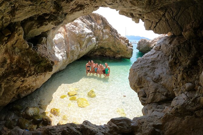 Boat tour to Egadi Favignana and Levanzo islands from Trapani - Cala Minnola closes with pine trees and green water