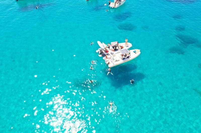 Cagliari: Boat Tour, 4 Stops, Swim, Snorkeling, & 1 Spritz - Cala Bernat: the first chance to swim
