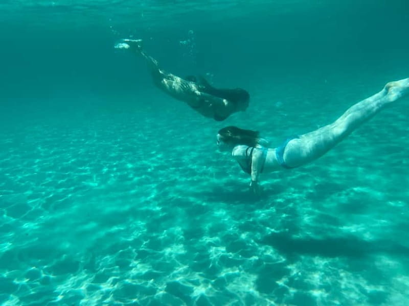 Cagliari: Boat Tour with 4 Swim Stops, Snorkeling & Prosecco - Practical booking advice for a smoother morning or afternoon