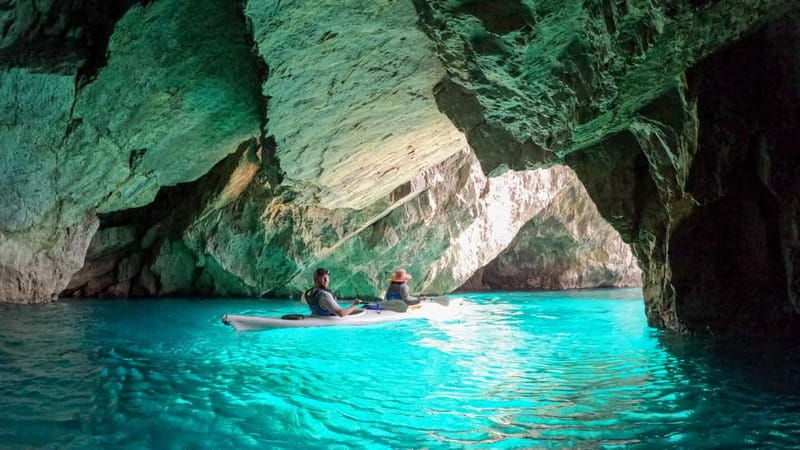 Capri: Caves and Beaches Kayaking Tour with GoPro Photos - Passing the Star Arch and reaching the Faraglioni