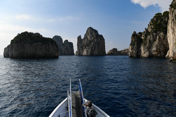 Capri Coast to Coast: Boat Tour with Optional Blue Grotto - The clockwise route around Capri