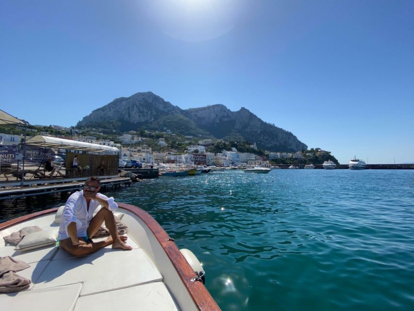 Capri: Island and Grottos Boat Cruise with Snacks and Drinks - Punta Carena and the Faraglioni