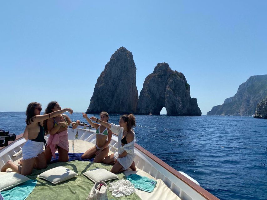 Capri: Island and Grottos Boat Cruise with Snacks and Drinks - Swimming from the boat