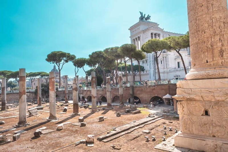 Colosseum, Roman Forum & Palatine Hill Entry and Audioguide - Walking through the Roman Forum