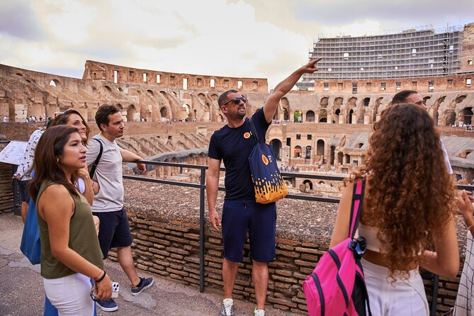 Colosseum, Roman Forum & Palatine Hill Guided Tour - Entering the Colosseum on the first and second levels