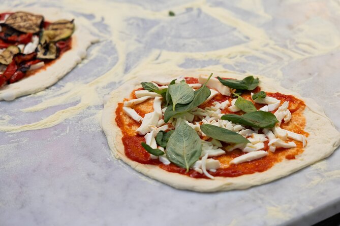 Cooking Class in the Heart of Rome: Pizza and Tiramisu Making - Sitting down to eat your own work