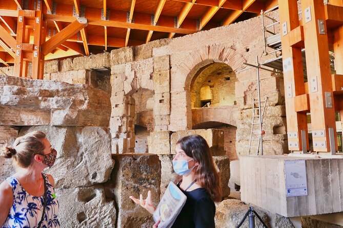 Expert Guided Tour of Colosseum Arena OR Underground, and Forum - From the Arch of Constantine to the Roman Forum