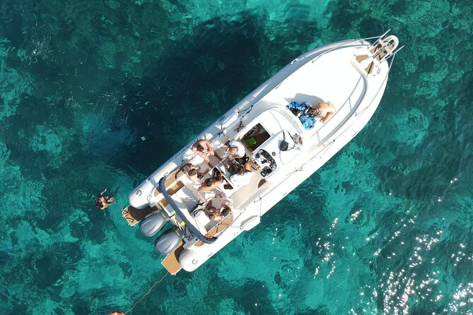 Favignana and Levanzo, Egadi islands tour by boat from Trapani - Cala Azzurra starts the day in clear water