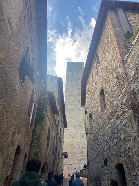 Florence: Day Trip with Free Time in San Gimignano and Siena - San Gimignano: towers, stone lanes, and artisan shops