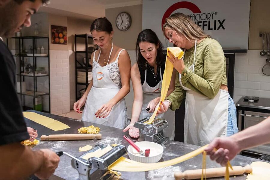 Florence: Handmade Pasta & Dessert Class with Unlimited Wine - Making pasta instead of just photographing it