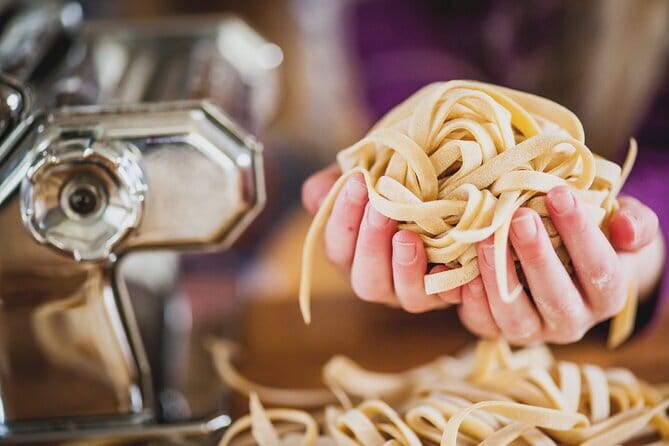 Florence: Pasta Cooking Class with Unlimited Wine - Pasta making inside a medieval Florence tower