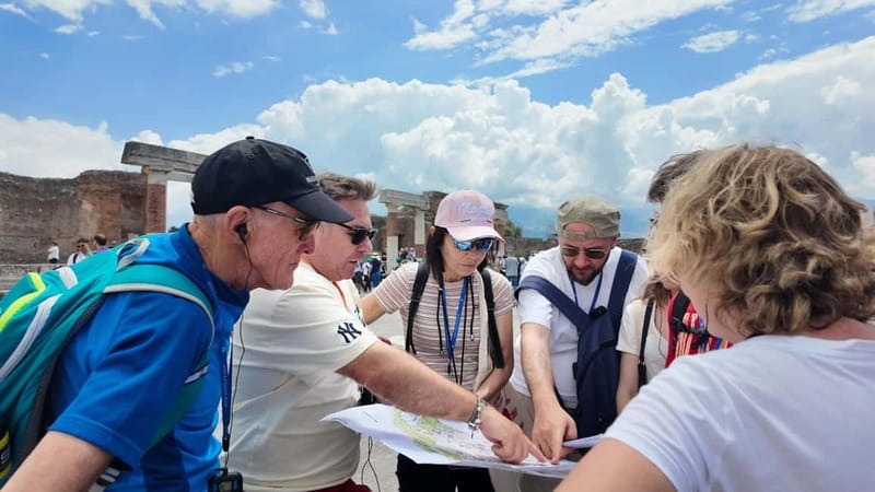 From Naples: Guided tour of Pompeii skip-the-line and round-trip train - The people and stories behind the ruins