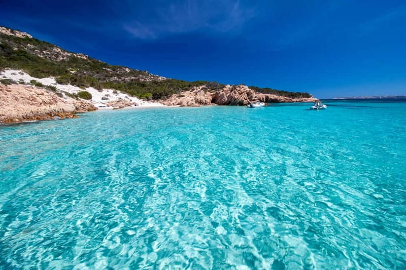 From Palau: 4 stops boat tour to La Maddalena archipelago - Budelli: pink sand from the water and a swim at Piscine Naturali