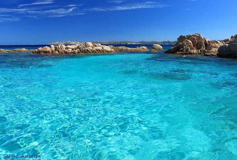 From Palau: 4 stops boat tour to La Maddalena archipelago - La Maddalena town adds a welcome change of pace