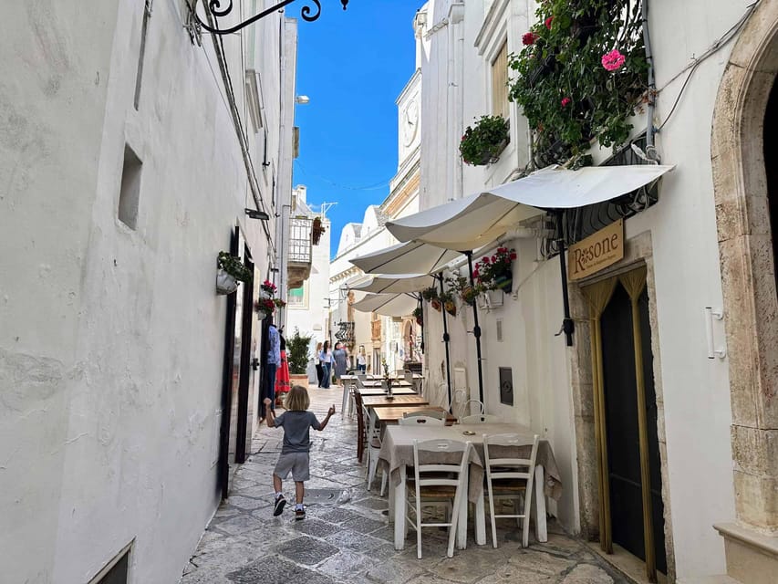 Itria Valley: Polignano, Ostuni, and Locorotondo, from Bari - Polignano a Mare: cliffs, caves, and the best first impression