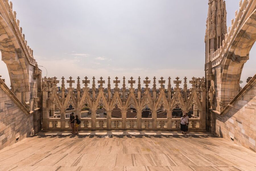 Milan Duomo and Rooftop 2-Hour Guided Tour - Taking the elevator to the marble roof