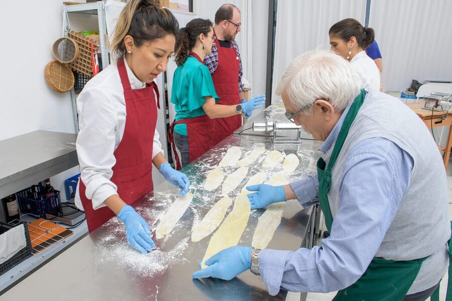 Milan: Italian Cooking Class with Food and Wine - Making pasta from flour, eggs, and patience