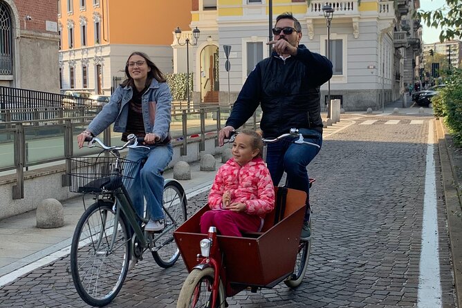 Milan's Hidden Gems: Unique Bike Tour (ENG, NL) - Piazza della Conciliazione enters an upscale district