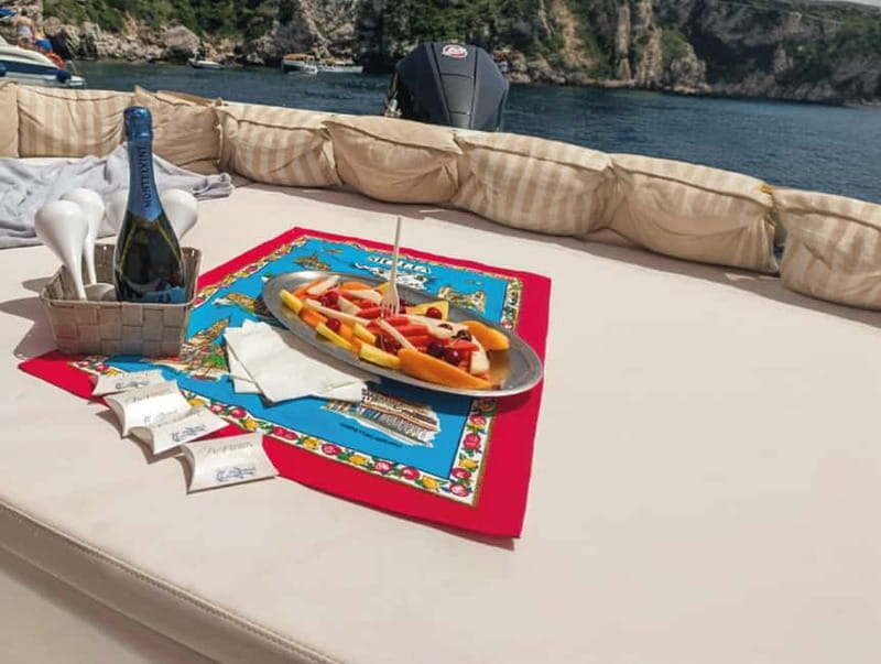 Naxos: Isola Bella, Blue Grotto, & Mazzarò Bay Boat Tour - Seeing Taormina from the water