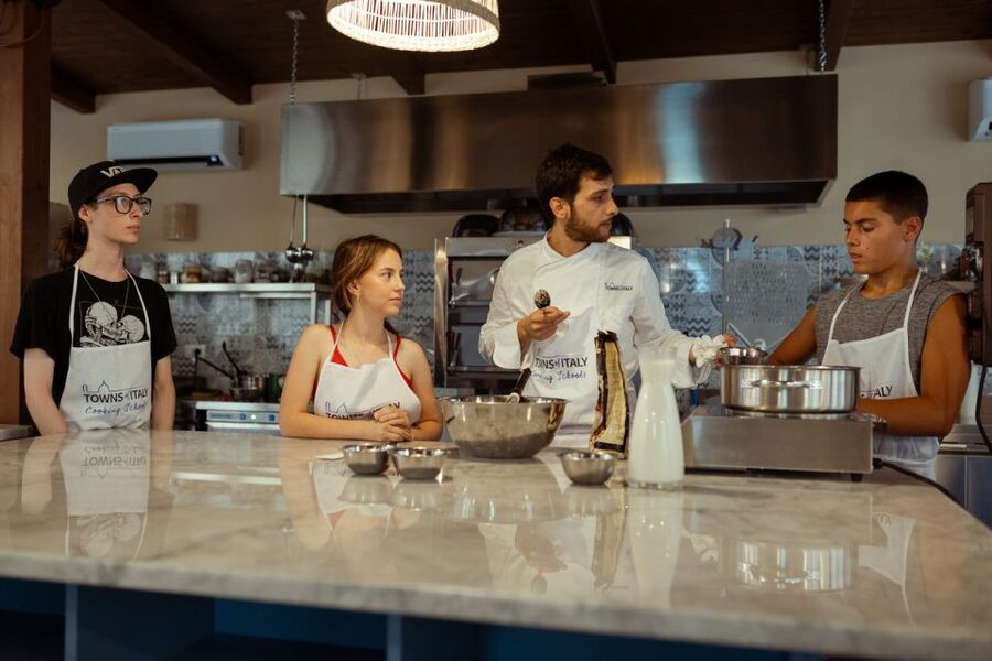 Palermo: Pizza and Gelato Cooking Class with Dinner and Wine - Stretching, saucing and baking your own pizza