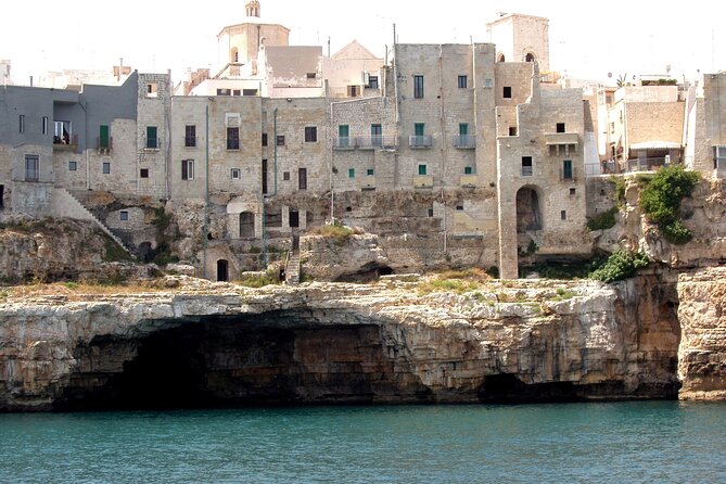 Polignano a Mare boat tour emotions, caves, diving and appetizers - Captain commentary, music, and the mood on board