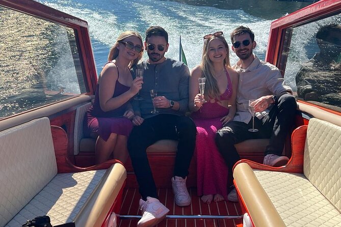Private Tour by Classic Wooden Boat on Lake Como - Moltrasio, Villa Le Fontanelle, and celebrity connections