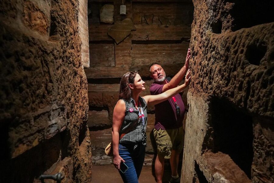 Rome: Catacombs and Capuchin Crypt Guided Tour with Transfer - Walking through the Roman catacombs