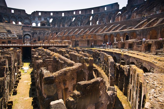 Rome: Colosseum Underground and Roman Forum Guided Tour - Entering the Colosseum arena