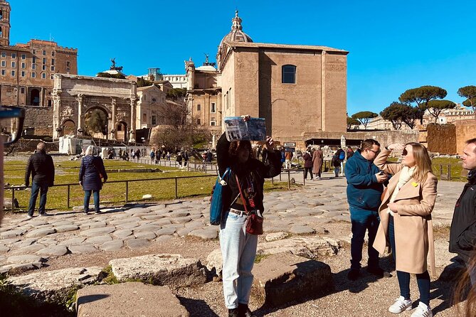 Rome: Colosseum with Arena, Roman Forum and Palatine Guided Tour - Walking Through the Roman Forum