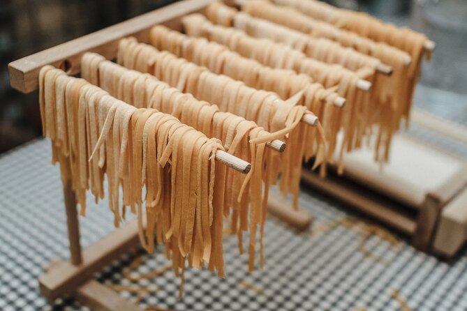 Rome Cooking Class: Make Pasta, Dine & Drink Wine With Local Chef - What the Trastevere setting adds