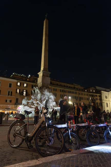 Rome: E-Bike Night Tour with Food and Wine Tasting - Wine and salumi near Ponte Sant’Angelo