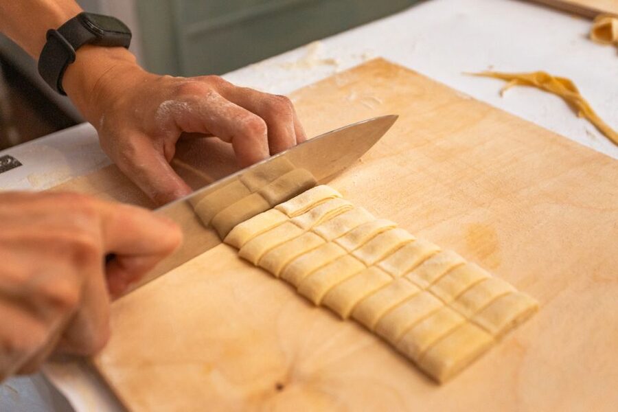 Rome: Fettuccine and Tiramisu Cooking Class with Wine - Sitting down to eat your own work