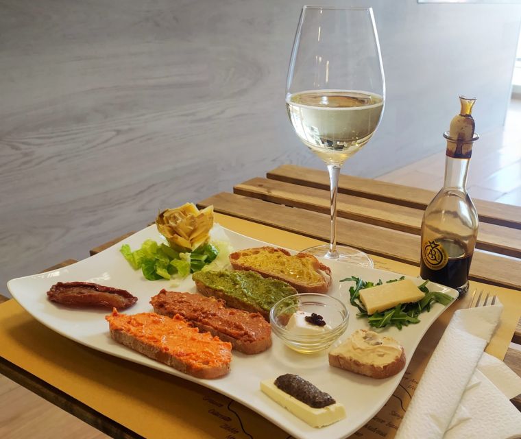 Rome: Food Tour with Unlimited Food and Barolo Wine - First stop: cheese, charcuterie, truffles, and Prosecco