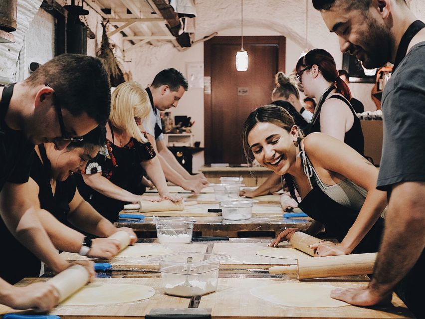 Rome: Pasta Making with Wine Tasting and Dinner in Frascati - Eating the pasta you made in the old cellar