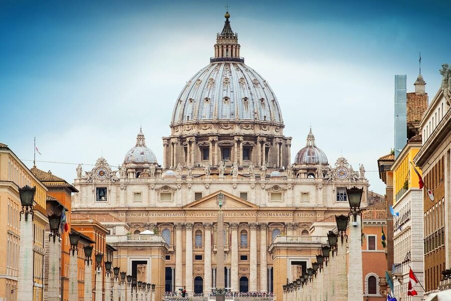 Rome: St. Peter's Basilica, Dome, and Vatican Grottoes Tour - Inside the enormous basilica