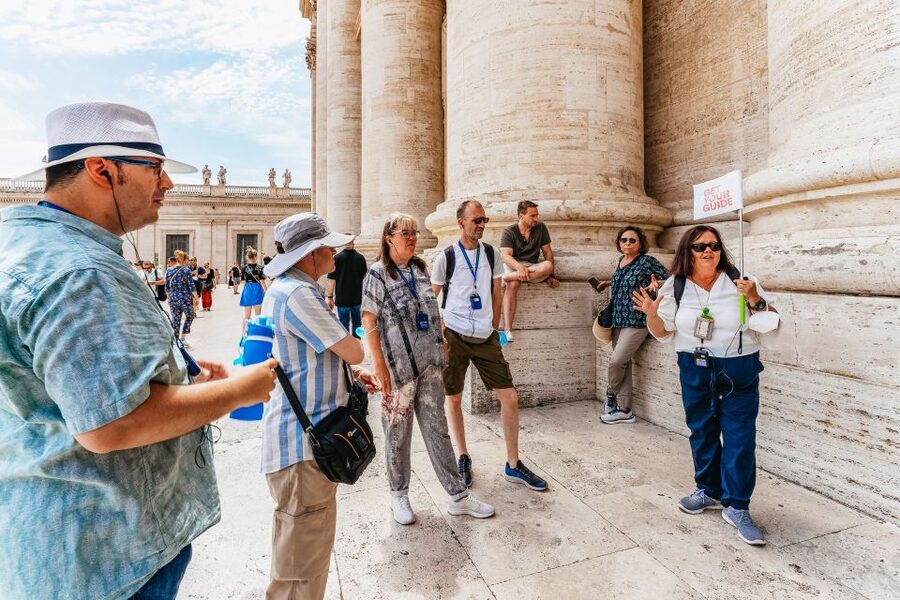 Rome: St. Peter's Basilica, Square and Grottoes Guided Tour - Inside the Basilica: gold, mosaics, and giant proportions
