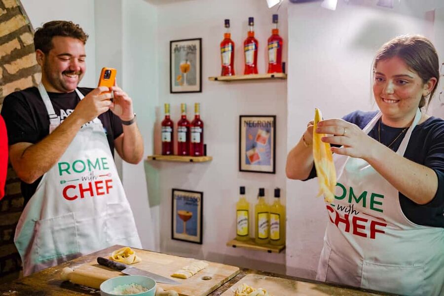 Rome: Traditional Pasta with Cocktails Cooking Class - The atmosphere: music, banter, and a shared table