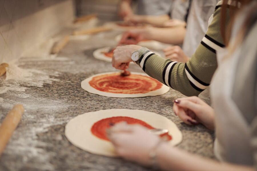 Rome: Traditional Pizza Cooking Class near Piazza Navona - Baking your Roman pizza