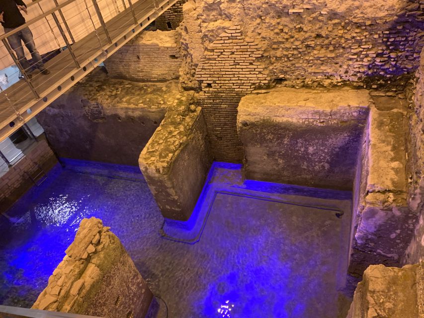 Rome: Trevi Fountain District Underground Domus Guided Tour - Roman rooms, luxury, and daily life