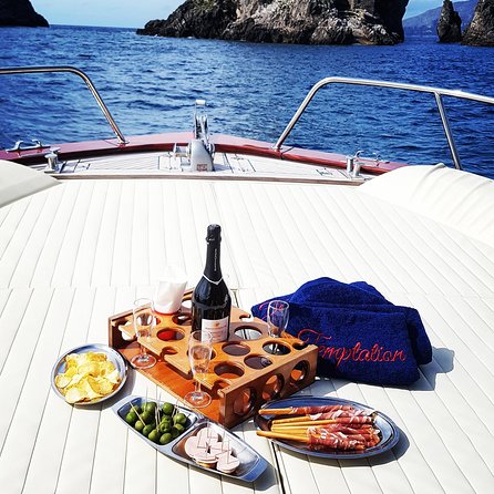 Small Group Boat Tour: Day Cruise from Sorrento to Capri - The crew makes the small boat work