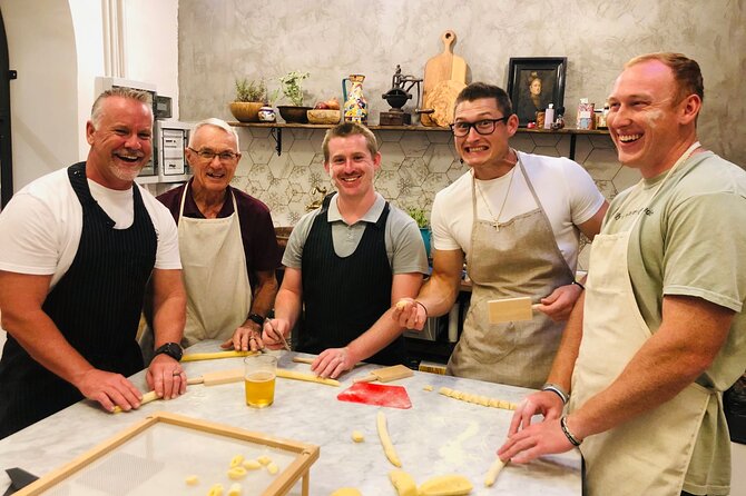 Super Fun Pasta & Gelato Class by Vatican with Wine + Oil Tasting - Making pasta with your hands and a rolling pin