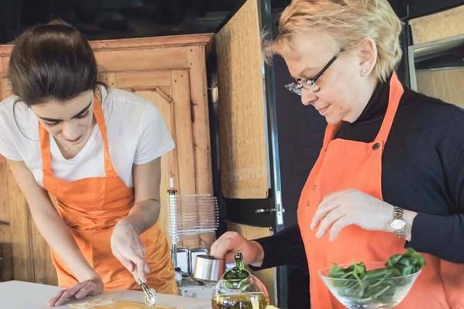 The Secrets to Learn Fresh Pasta and Tiramisù in a Glam Home - Making tagliatelle with tomato sauce