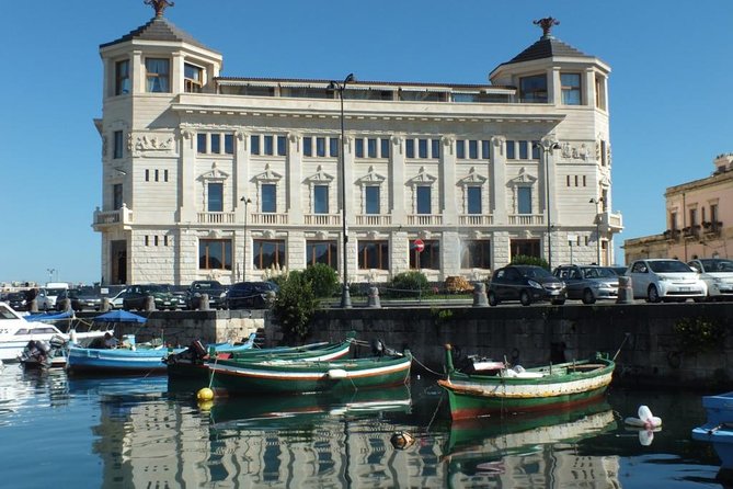 Tour of the island of Ortigia and exploration of sea caves with baths. - Timing, weather, and planning your day
